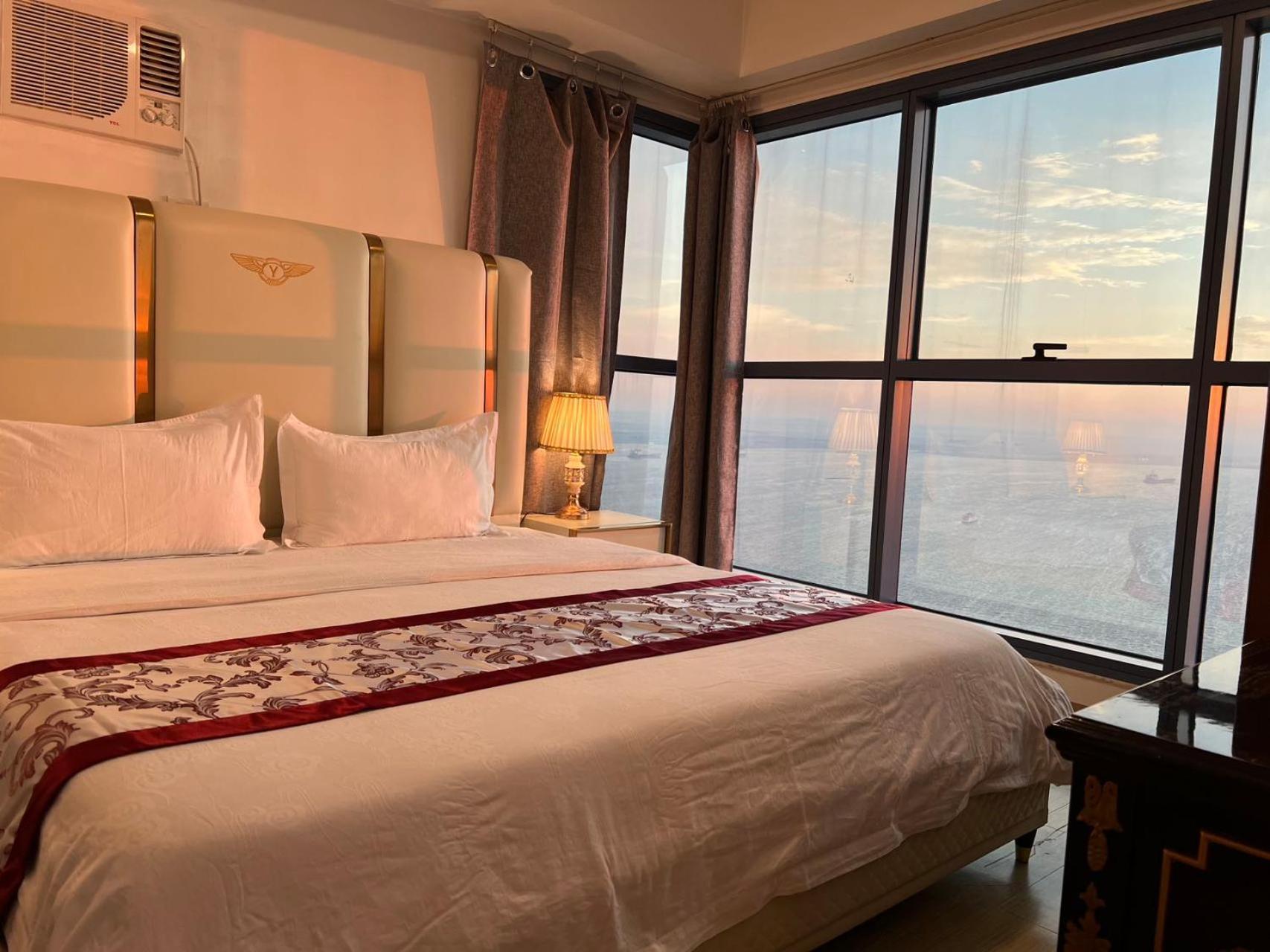 Апартаменты Sunset House Roxas Bay Манила Экстерьер фото