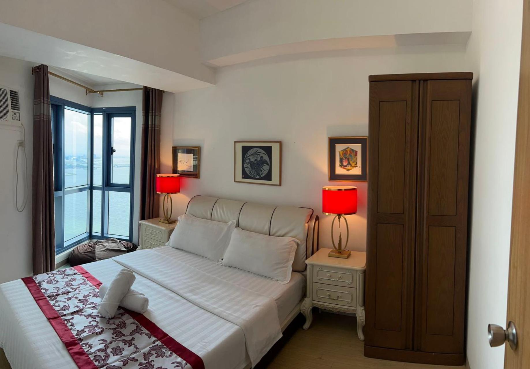 Апартаменты Sunset House Roxas Bay Манила Экстерьер фото